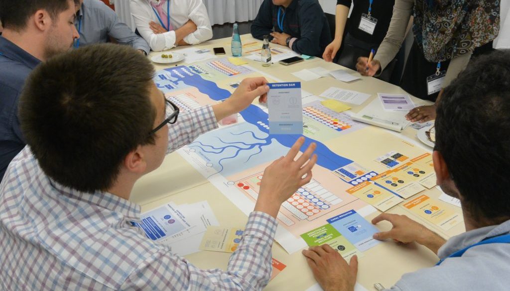 People playing social simulation Nexus in Dresden